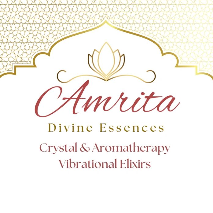 Elegant logo for Amrita Divine Essences featuring crystal and aromatherapy vibrational elixirs.