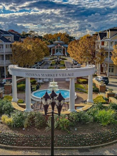 Smyrna Market Village white marble Pavilion and water fountain.