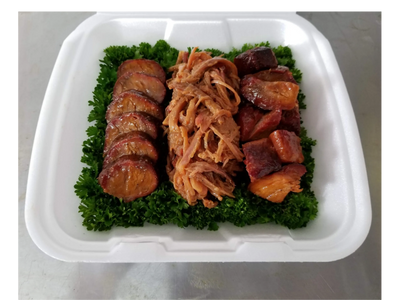 A container of our award-winning barbecued food.
