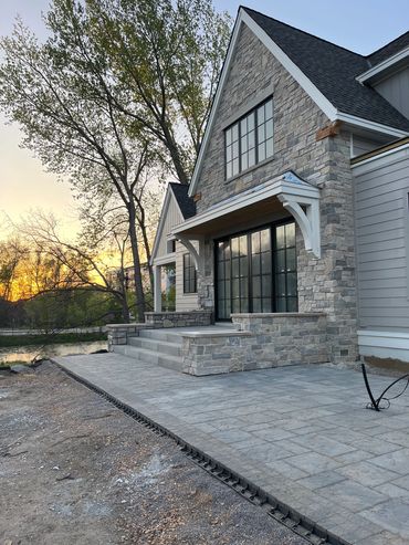 Front stoop, made out of stone.