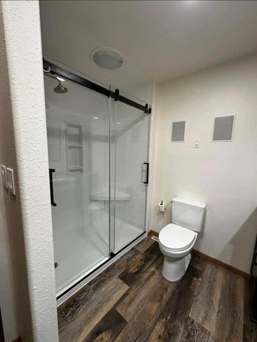 Clear glass barn style shower door