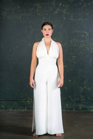 Glamorous halter neck bridal jumpsuit with boned bodice and  super wide leg trousers.