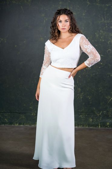 modern wedding outfit with lace top and floor length skirt.