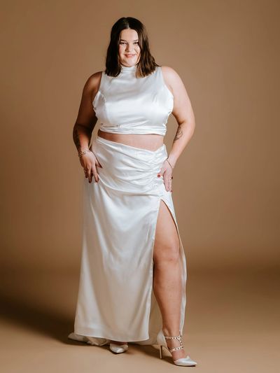 Curvy plus size bridal co-ord. Silk top with a thigh high slit skirt.