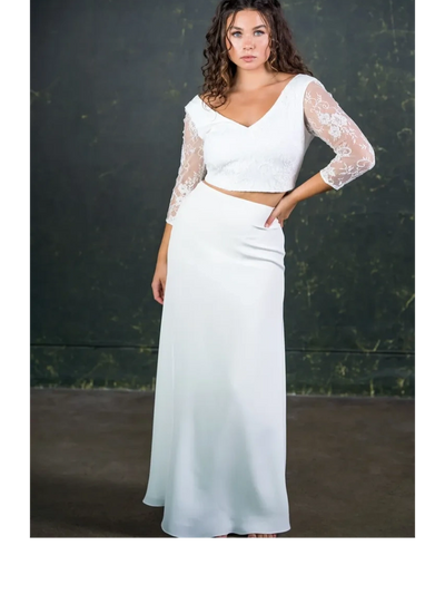 Modern wedding two piece. lace top with fitted floor length silk skirt.
