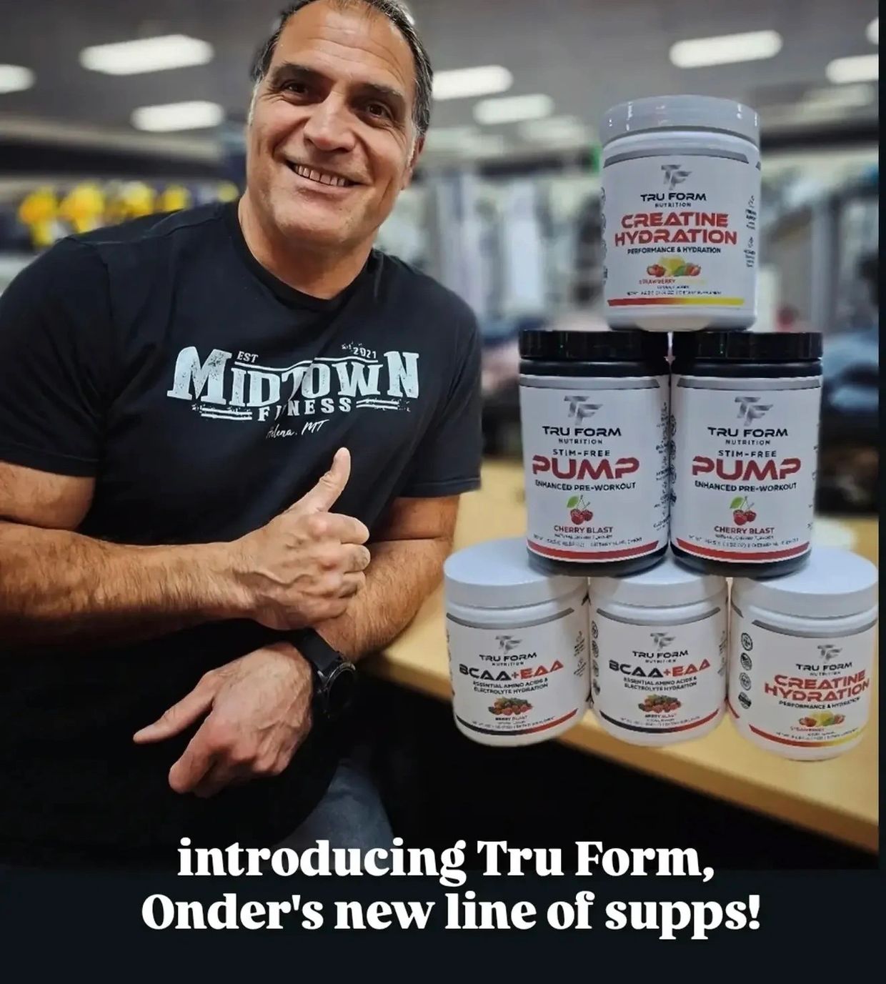Man smiling next to Tru Form supplement containers.