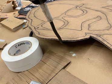 Work in progress shot of the cardboard Shakespeare Totem.