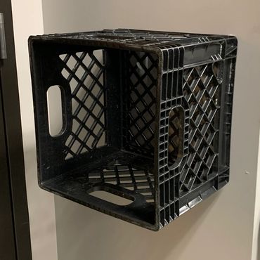 A milk crate shelf created through the use of command hooks.