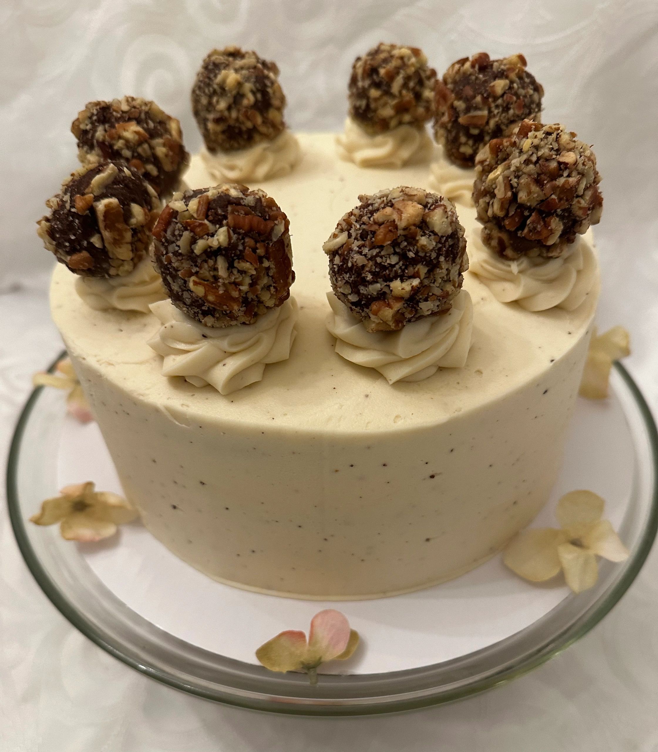Layered chocolate cake with bourbon brown butter icing, and bourbon trufffles rolled in pecans.
