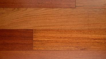 A display board of Natural Brazilian Cherry engineered hardwood flooring at Legit Flooring in Austin