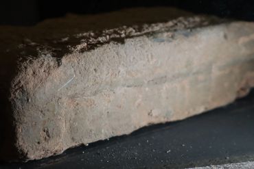 Newberry Tablet found in the roots of a fallen tree in Newberry Michigan 1896 (side view)