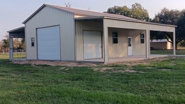 24x40x12 metal garage and workshop with two lean to's