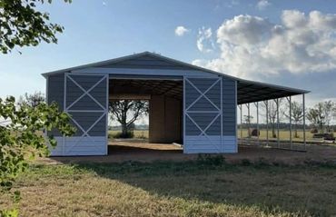 30x40x12 metal barn with slider doors