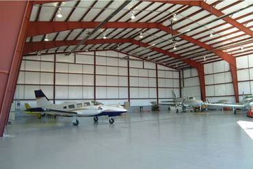 Airplane hangar built from red iron steel