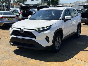 White Toyota RAV4 parked outdoors.