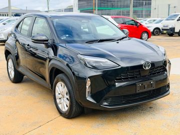Black Toyota crossover parked outdoors.