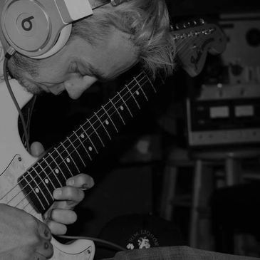 "Gio" from the Arizona punk band "Squared" laying down some guitar overdubs.