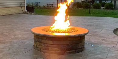 Stamped concrete, natural gas firepit, fire feature, Outdoor living space, hardscapes, patios