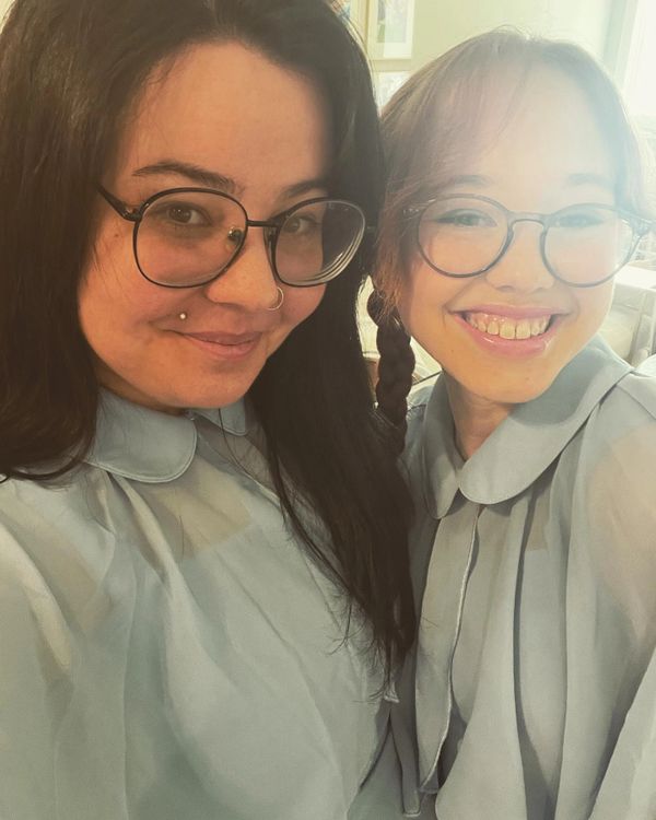 Mom and daughter dressed as fairy godmothers