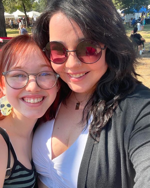 Teen daughter with mom at a fair