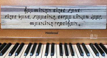 Brasswax - haiku pyrography