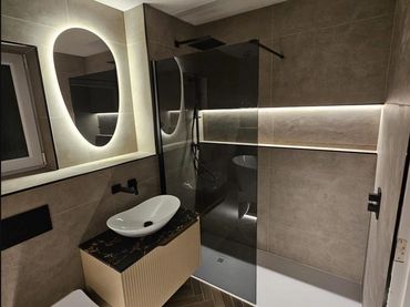 tile surround with natural stone accent