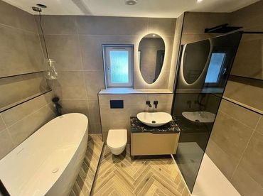 herringbone tile pattern in bathroom renovation