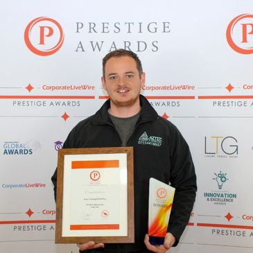 Aaron Horner of Aztec Valeting winning the mobile valeting company of the year 2021 from Prestige 