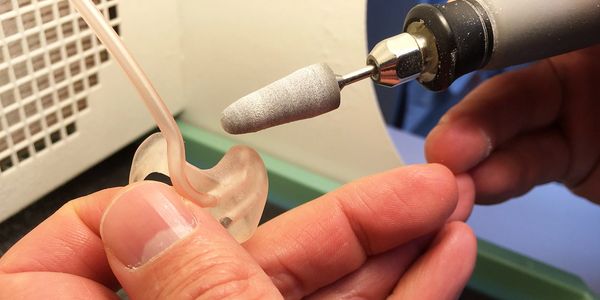 Earmold modifications are done on site  at Big Horn Basin Hearing and Speech in Cody, WY, which redu