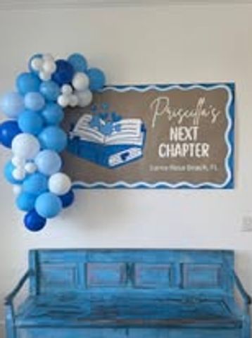 Hand painted 4 x 3 paper banner and 4 foot balloon garland make a beautiful first impression.