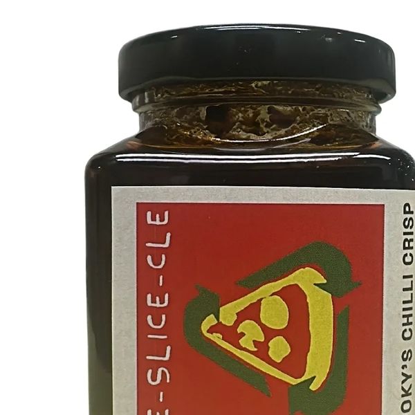 Jar of Spicy Slice-cle chili crisp sauce.