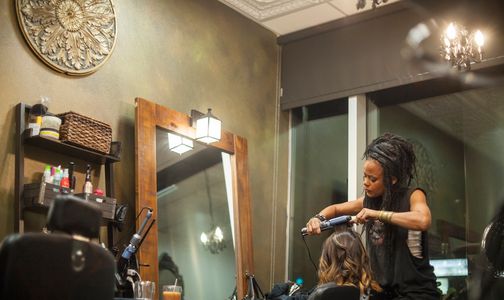 Rayna styling hair at private salon studio Rayna Hair Artistry in West Hollywood Los Angeles