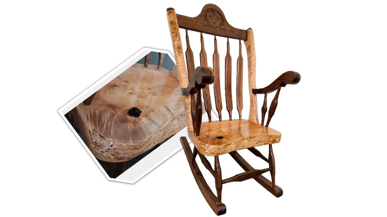 Handcrafted wooden rocking chair with detailed carvings and a natural wood finish.