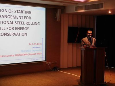 A scenic view of a mountain landscape under a blue sky with fluffy clouds, showcasing nature's beauty.