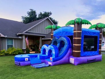 tropical combo bounce house with slide for smaller kids