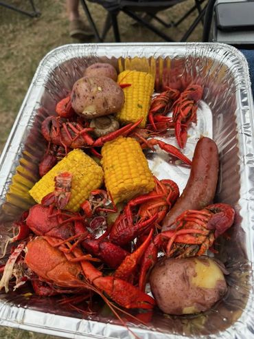 A tray of crawfish, corn, potatoes, and sausage at the 2026 Doyle Boil.