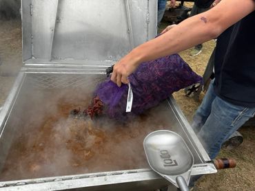 Crawfish are poured into a steaming cooker at the 2026 Doyle Boil.
