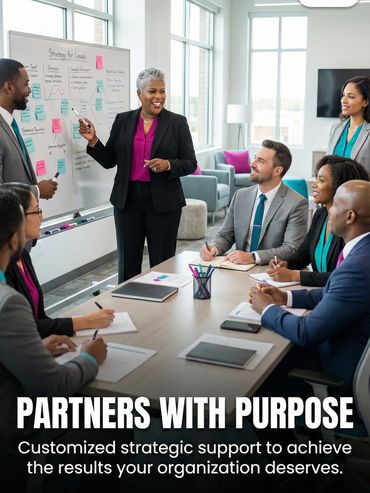 Business team collaborating in a bright office meeting room with a whiteboard.