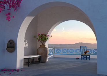 Greek arches at sunset with a cat