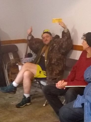 He won a gift card from the raffle we give when feeding the homeless.