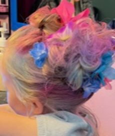 Spray your hair in fun colors like a unicorn. Colored kids hair sprayed