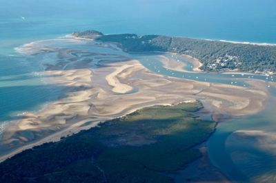 Quaintly named Seventeen Seventy overlooking Bustard Bay at low tide