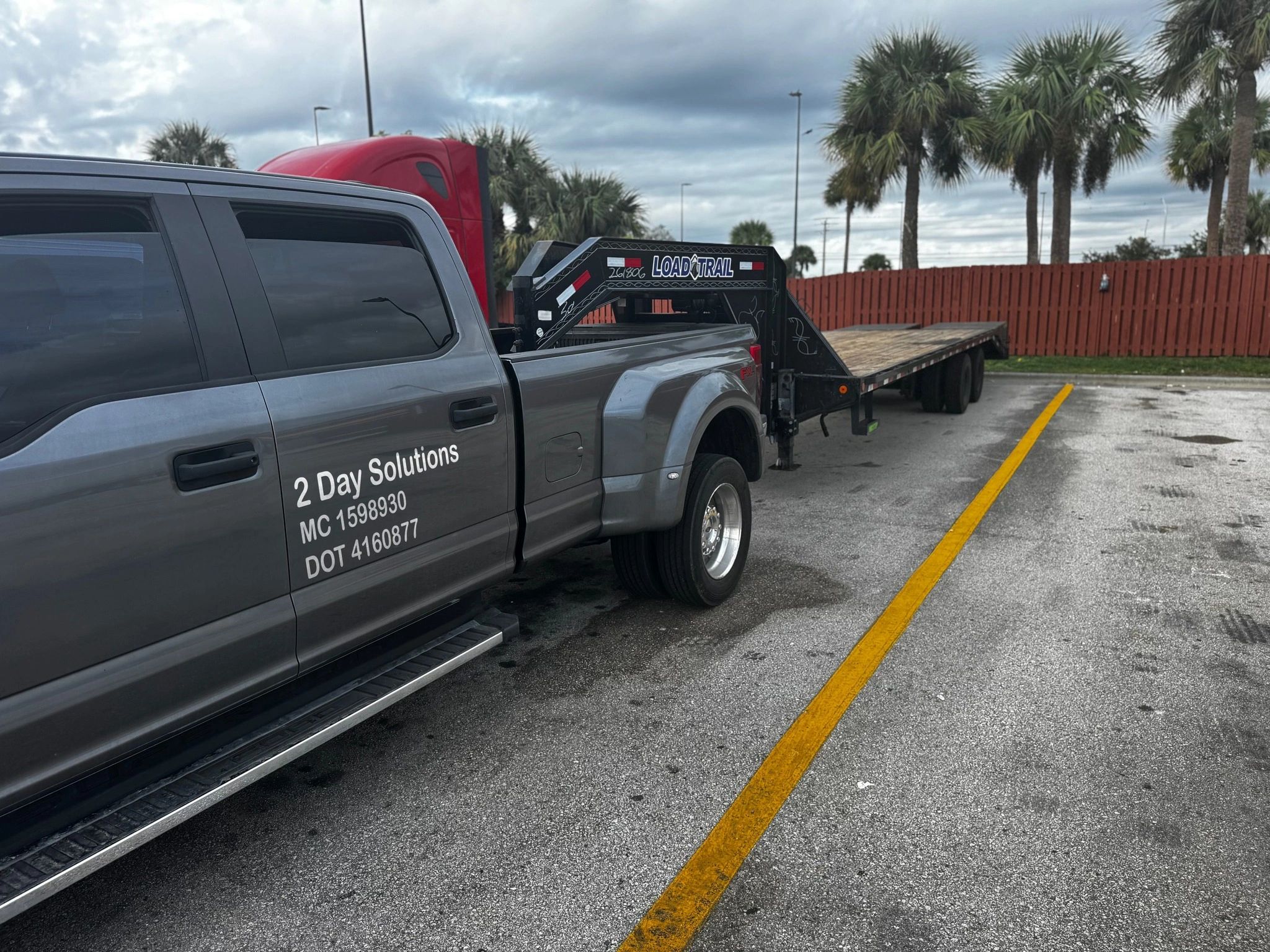 customize pick up vehicle towed with a load trail