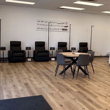 Recliners, a round table and our wall quote at our Rockville clinic