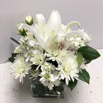 White flowers in a cube