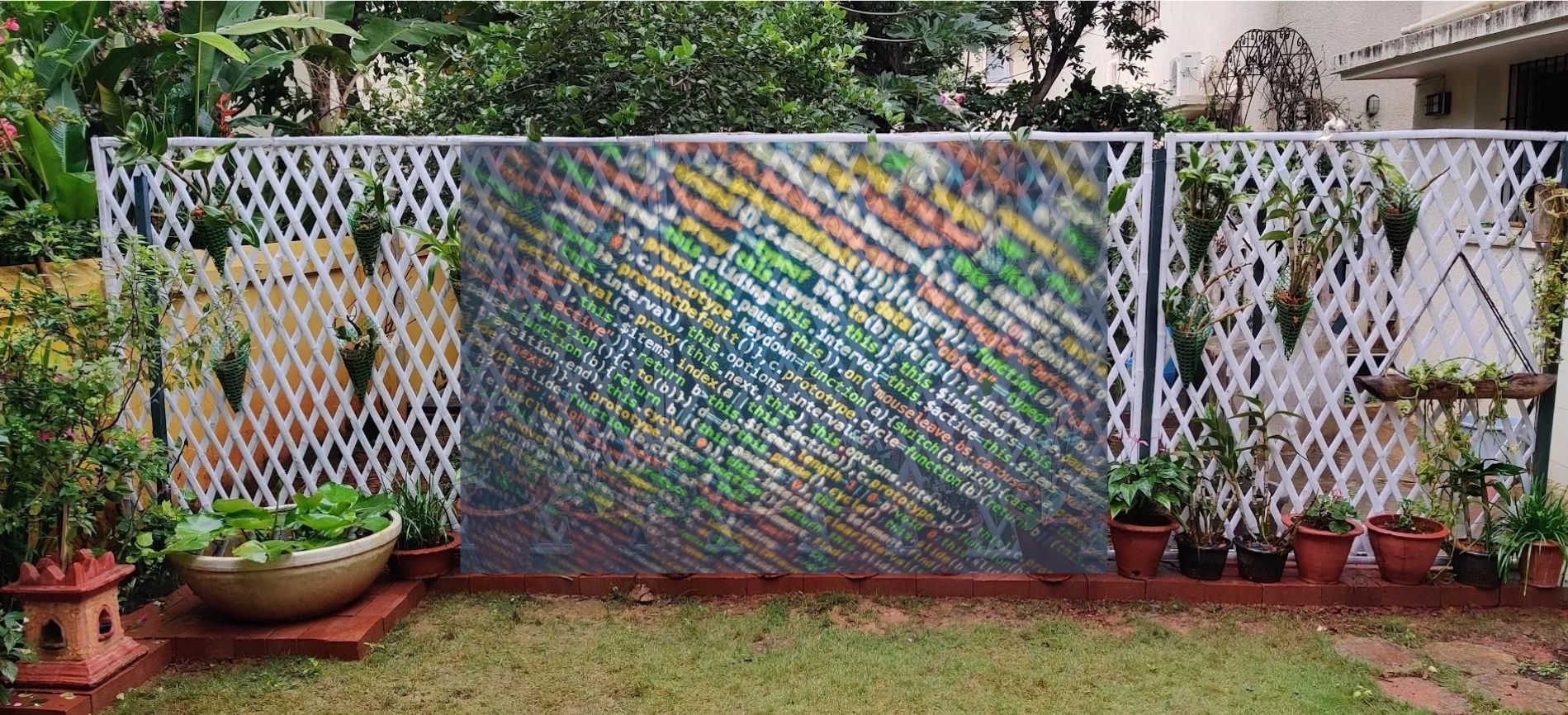 A garden with plants and a digital code overlay on a white lattice fence.