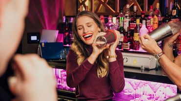 Group enjoying cocktail class at celebration event