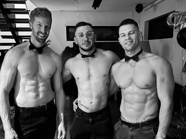 Male strippers posing for a Bowral hens party in the Southern Highlands.