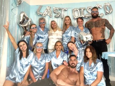 Southern Highlands hens party group celebrating with their male stripper in Bowral.