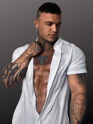 Sydney male stripper Justin from Young Gunz performing at a premium hens party in Sydney CBD